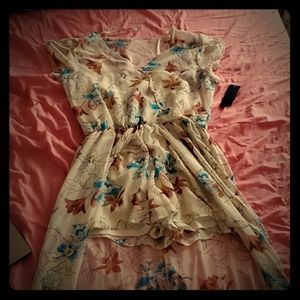 Romper with high low skirt